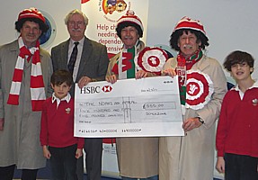 Presenting a cheque for the Noah's Ark Appeal at the Children's Hospital for Wales.
